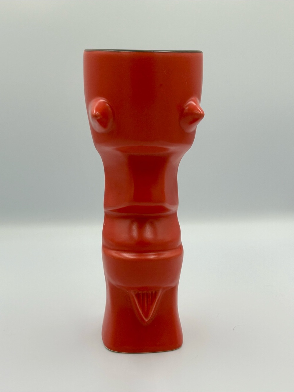 This is an "El Bastardo" tiki mug produced by Munktiki Imports